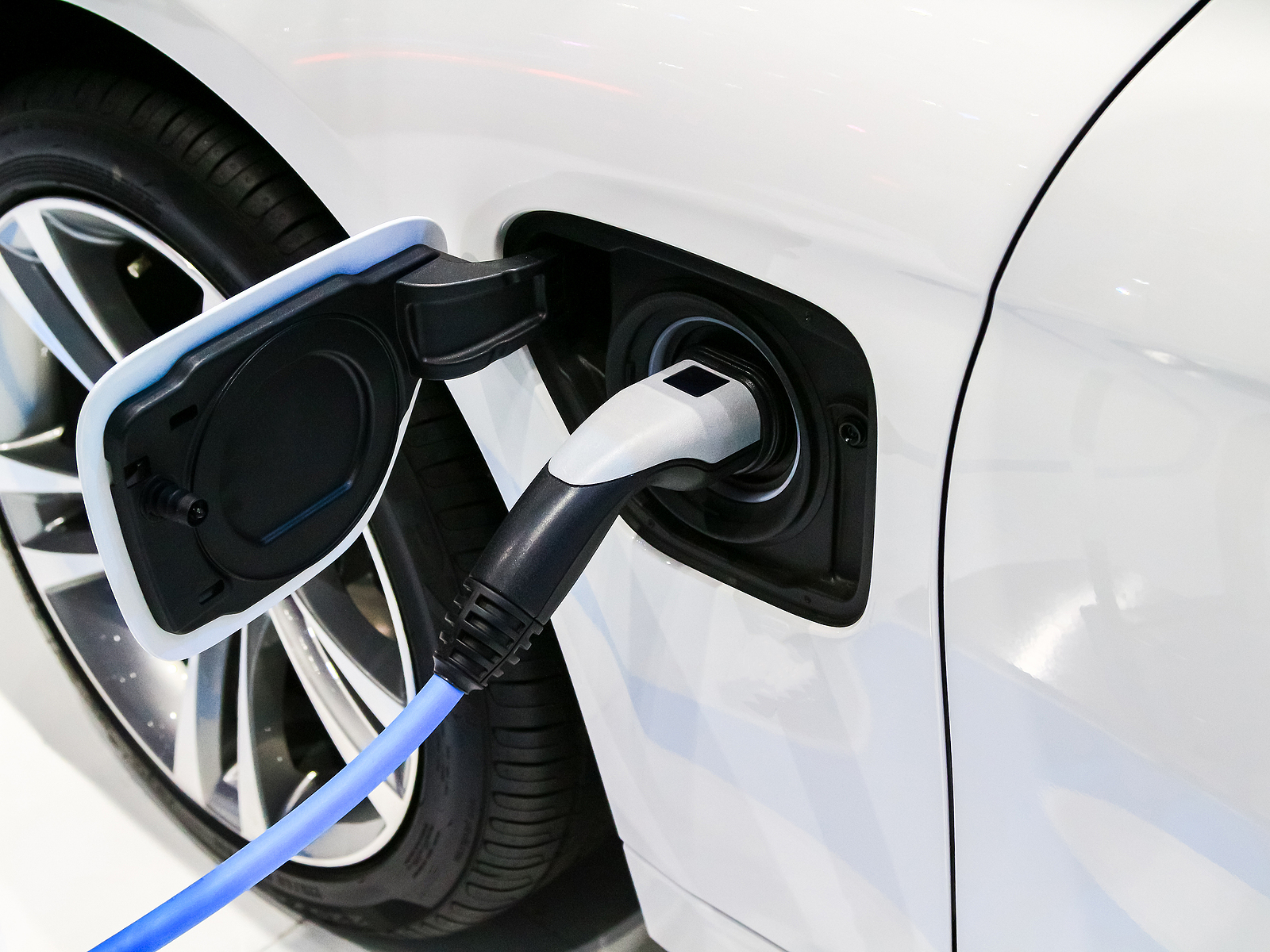EV Charging course - Power supply plugged for electric car
